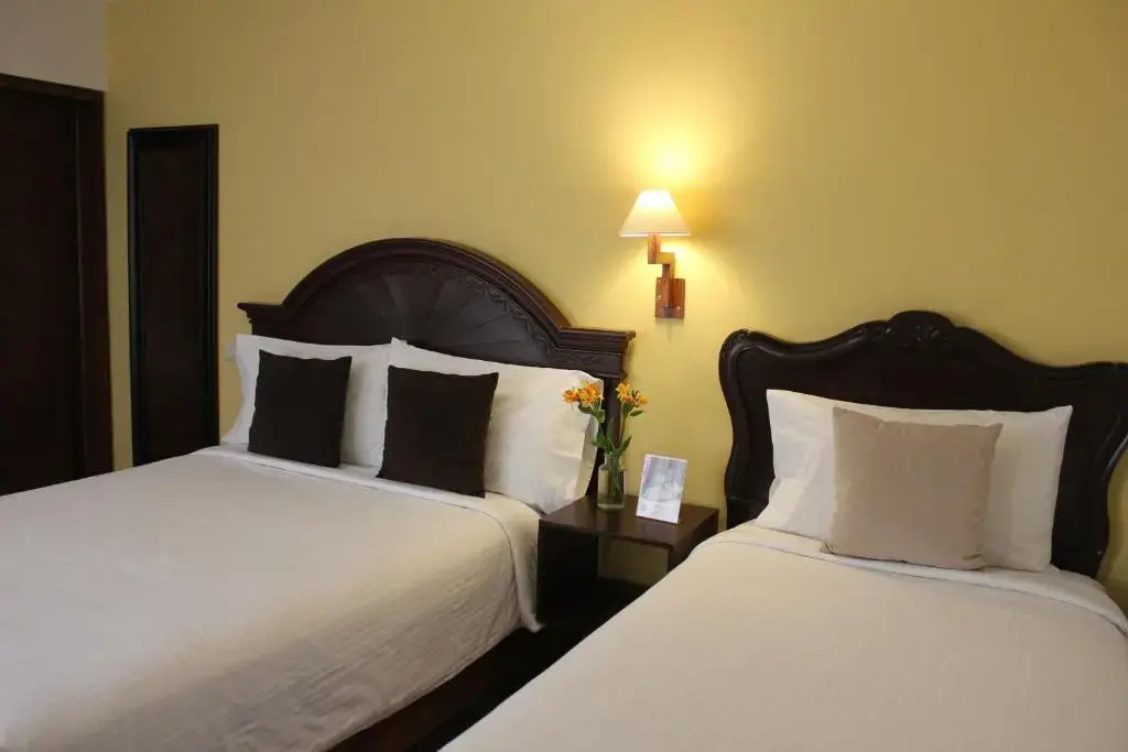 Entre Patios Hotel Boutique - Chambres