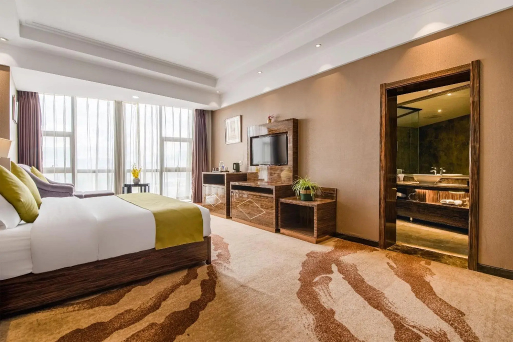 Kunming Xinshichao Hotel (Luo Tsuen Wan New Asia Sports City Branch)