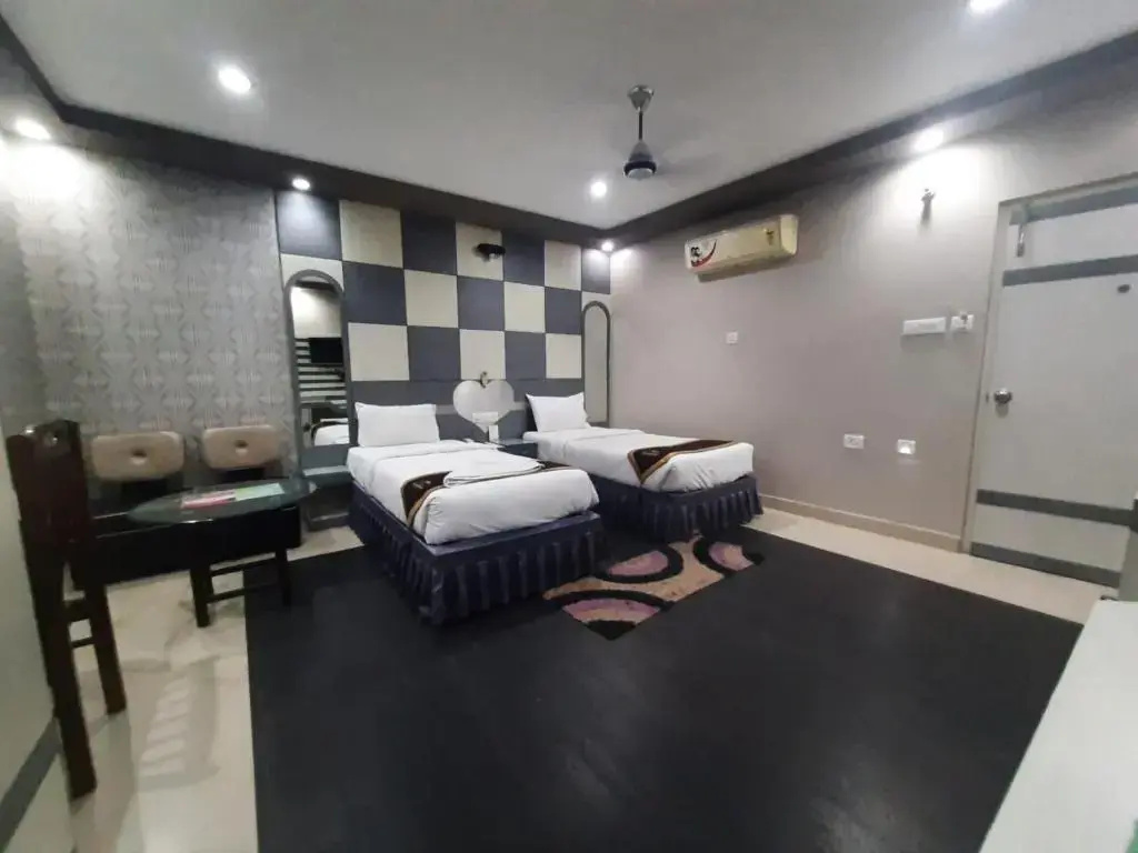 Hotel Corporate Inn - Chambres