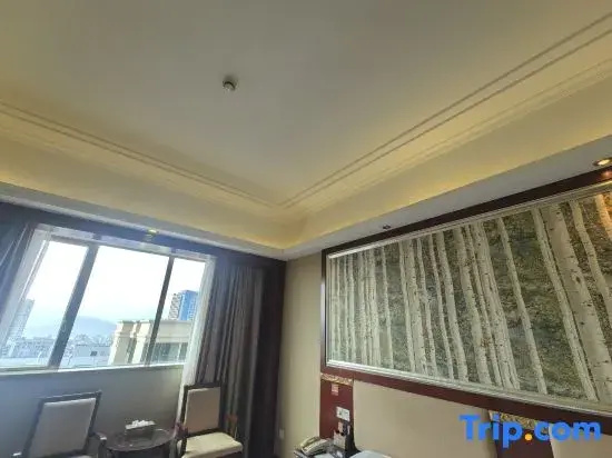 Longzhu Hotel - Chambres