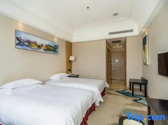 Sanyou International Hotel - Chambres