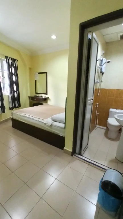 Ria Cameron Hotel - Chambres