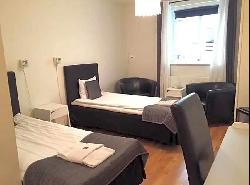 Stadshotellet Kristianstad - Chambres