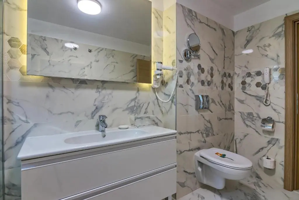 Hotel Saturn - Chambres