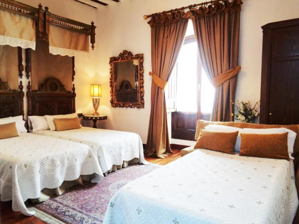 Boutique Hotel Nueve Leyendas - Chambres