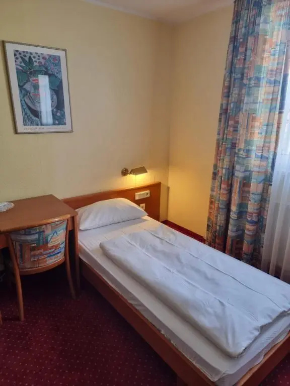 Hotel Mondial - Chambres