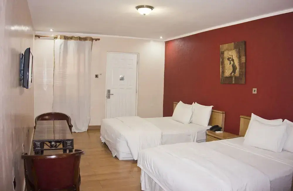 Tropical Enclave Hotel - Chambres