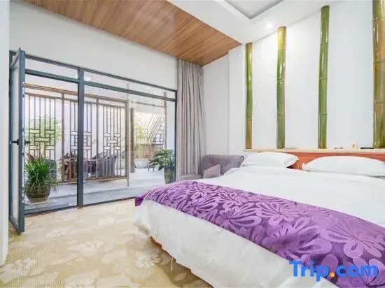 Yiya Holiday Inn - Chambres
