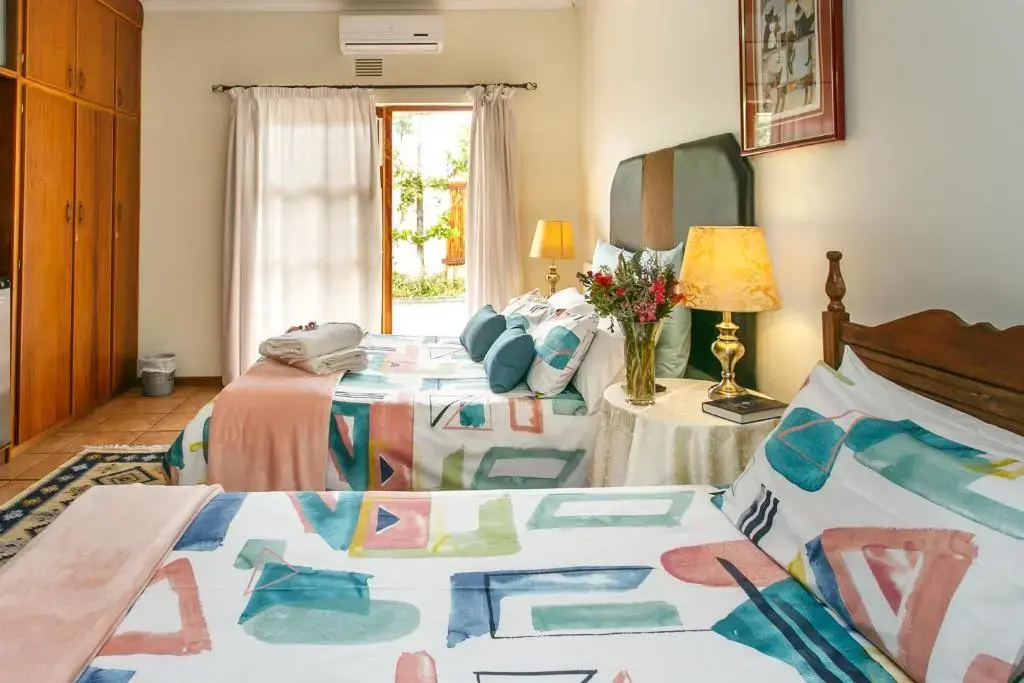 Standard Triple room with garden view