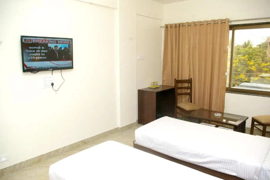 Hotel Gulmohar Pride - Chambres