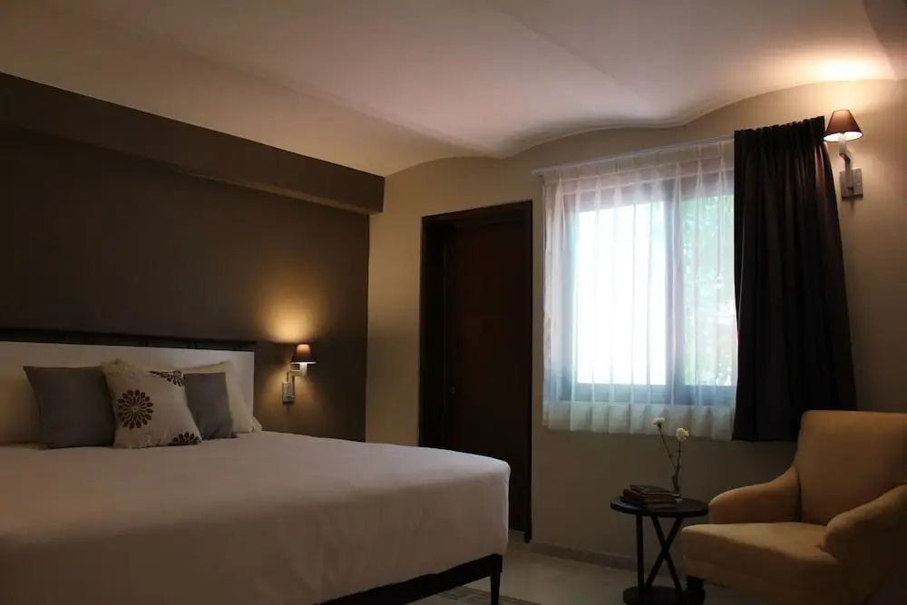 Entre Patios Hotel Boutique - Chambres