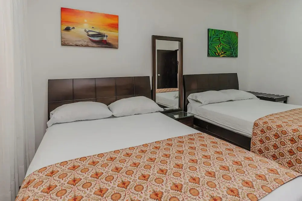 Casa Hotel Miriam - Chambres