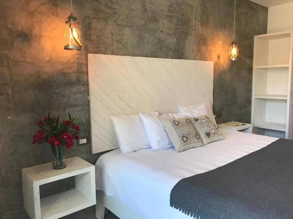 Double Suite with balcony and with pool view (full double bed)