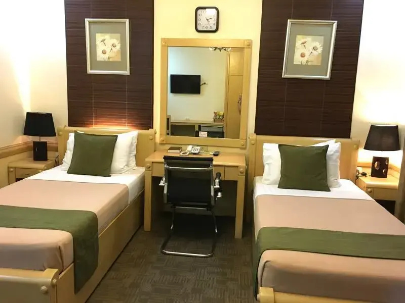 Phela Grande Residences - Chambres