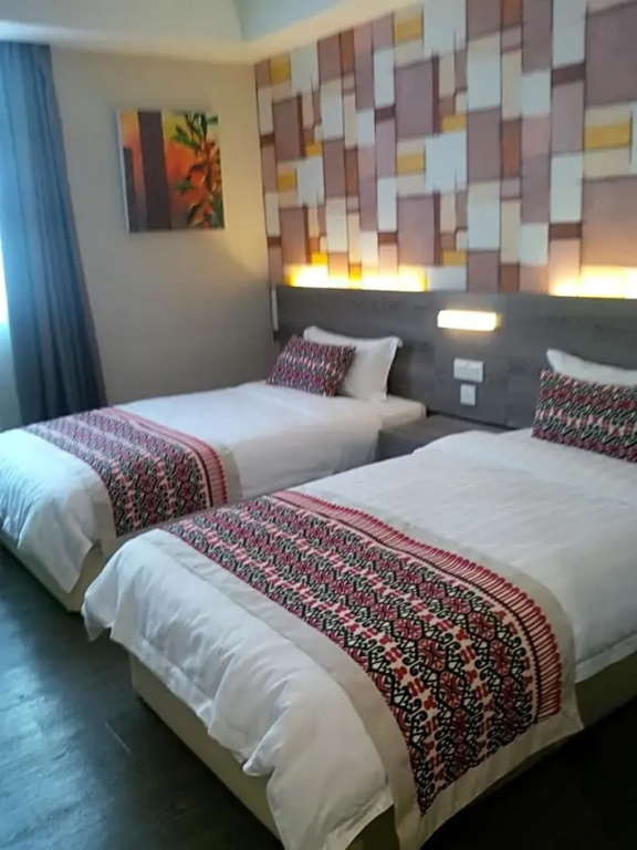 Ajang Hotel - Chambres