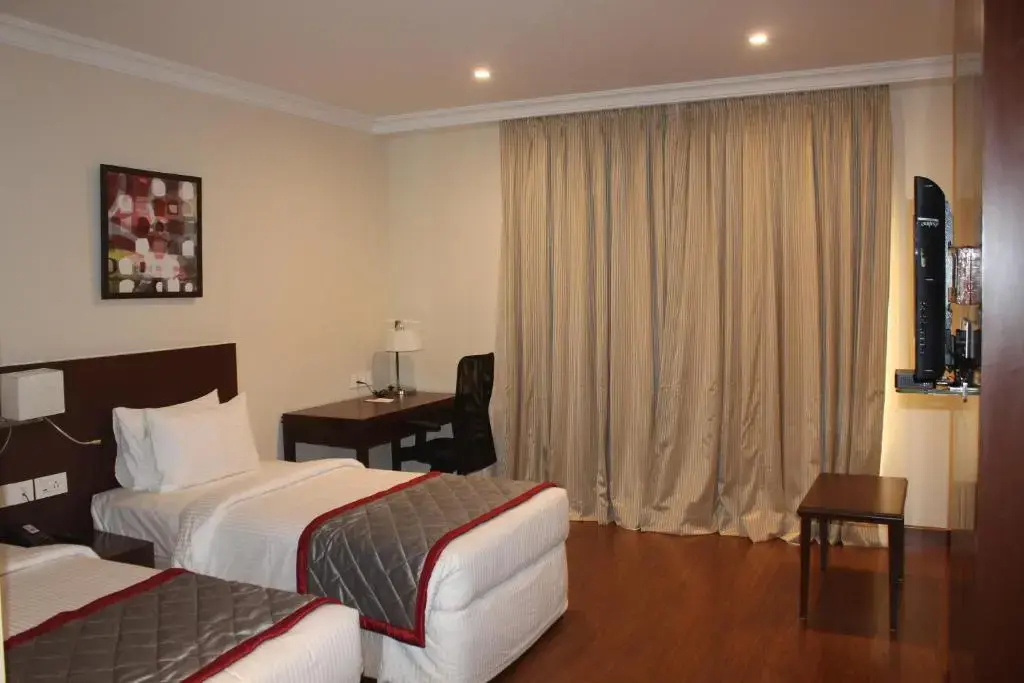 The Altruist Hitech Hotel - Chambres