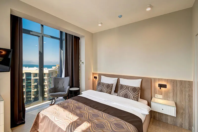 Двухместный номер Deluxe с видом на море двуспальная кровать в Real Apartments Sochi