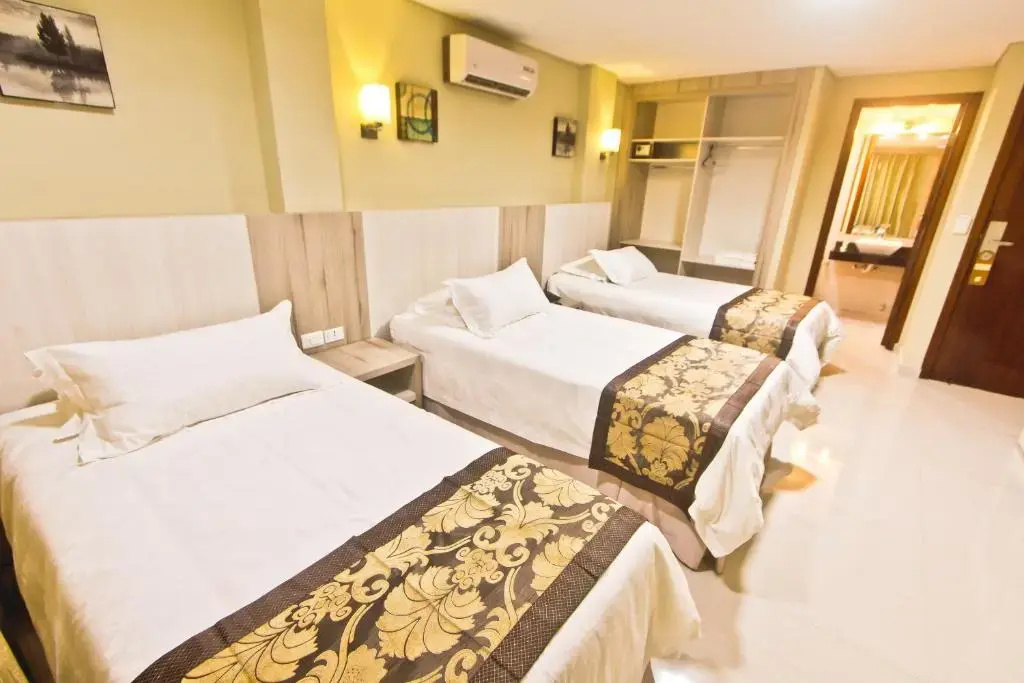 Megal Suites Hotel - Chambres