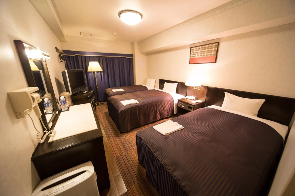 Hotel Claiton Esaka - Chambres