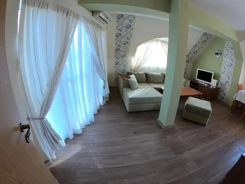 Aquaria Holiday Apartments - Chambres