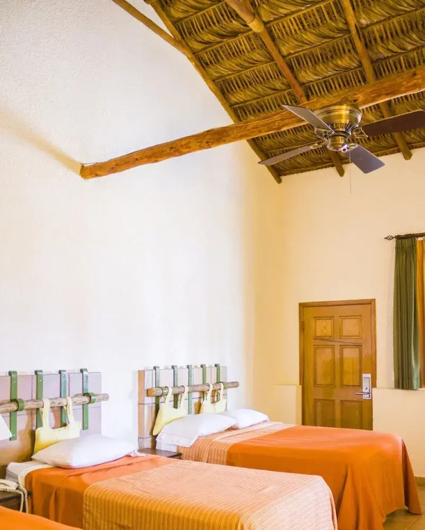 Hotel Palmas De Cortez - Chambres