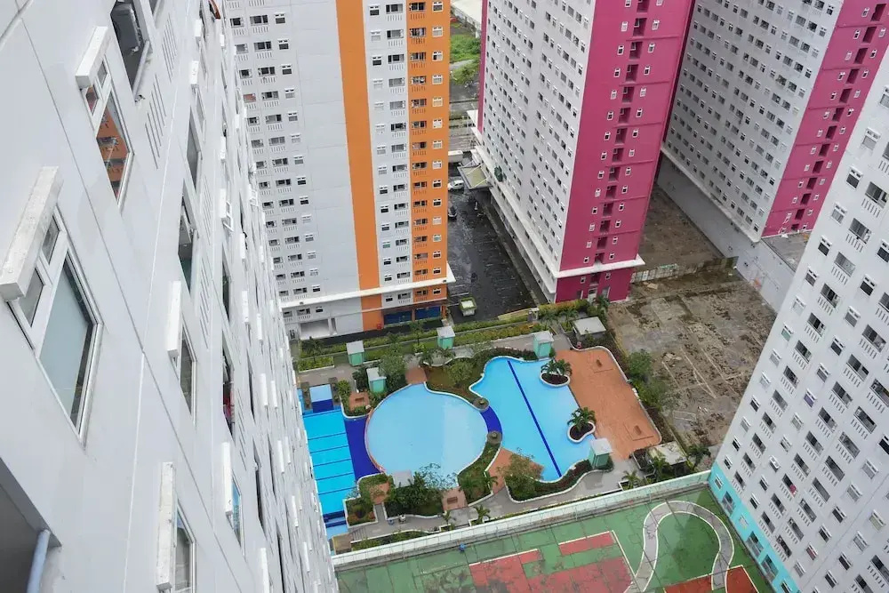 Cozy and Comfort Living Studio at Green Pramuka City Apartment by Travelio
