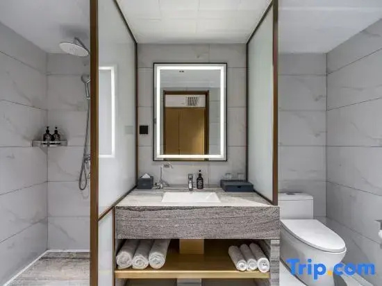 Xinyue Hotel - Chambres