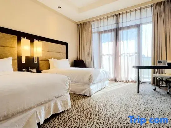NCEC Jinyuan Hotel - Chambres