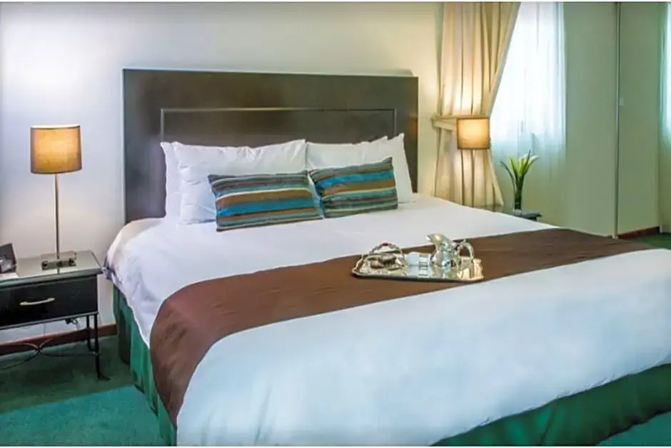 El Polo Hotel & Suites - Chambres