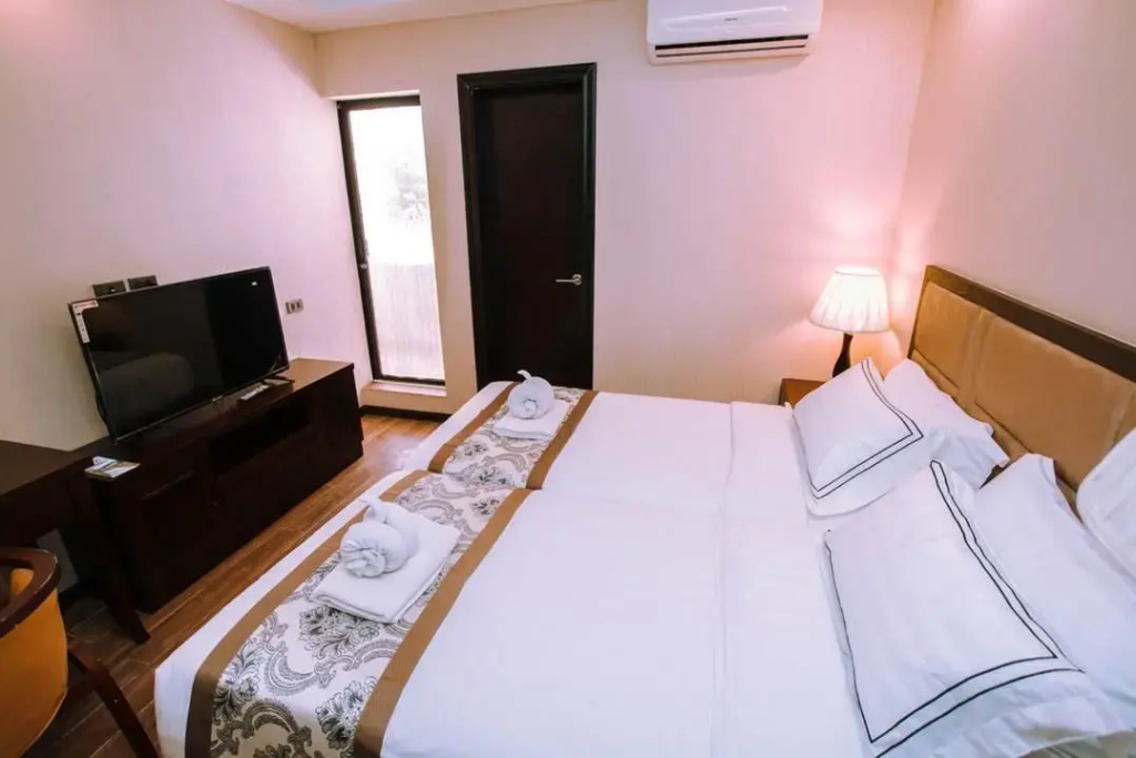 Palawan Uno Hotel - Chambres