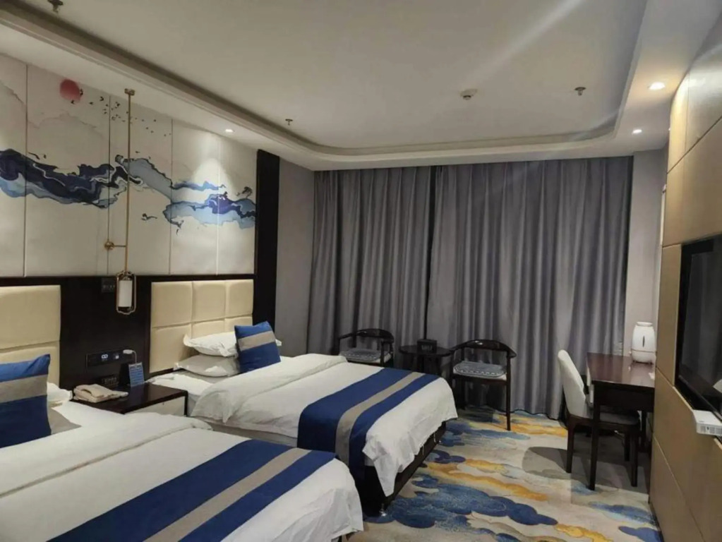 Hetian Huaya Hotel — фото 4