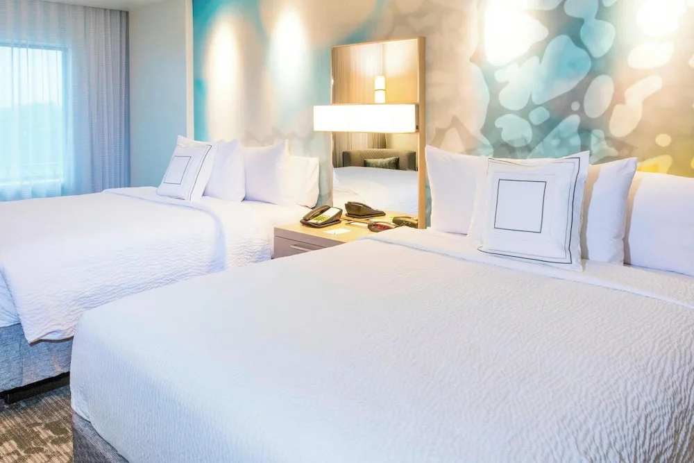 Deluxe Quadruple room with courtyard view