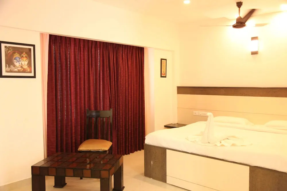 Hotel Karpagam International - Chambres