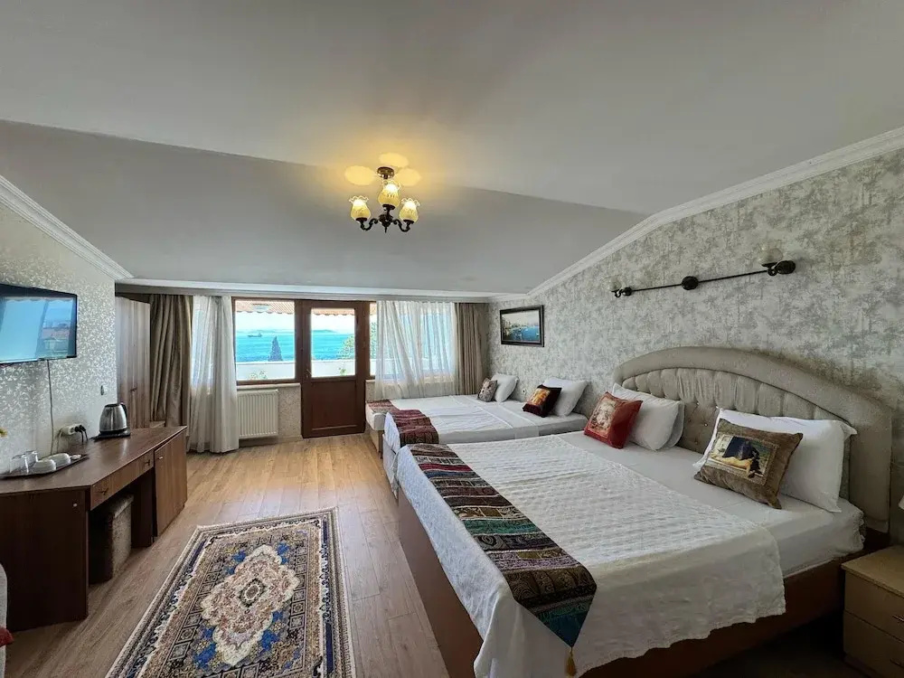 Quadruple room with sea view