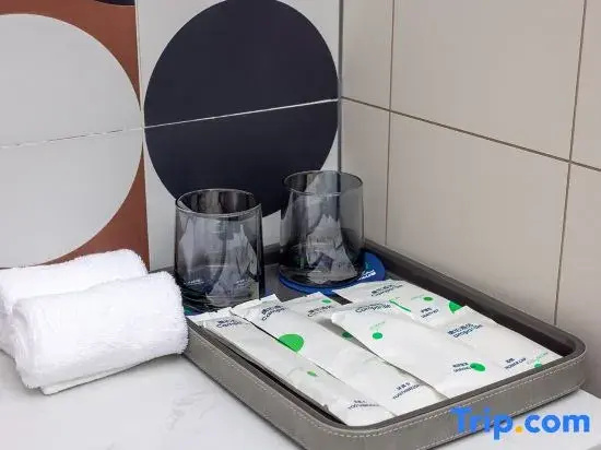 Huatong Hotel - Chambres