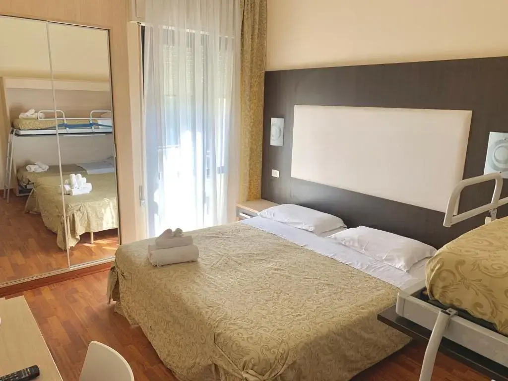 Standard Quadruple room with balcony