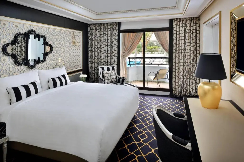 Double Junior Suite with balcony and with pool view (full double bed)