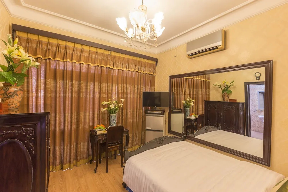 Dragon Hotel - Chambres