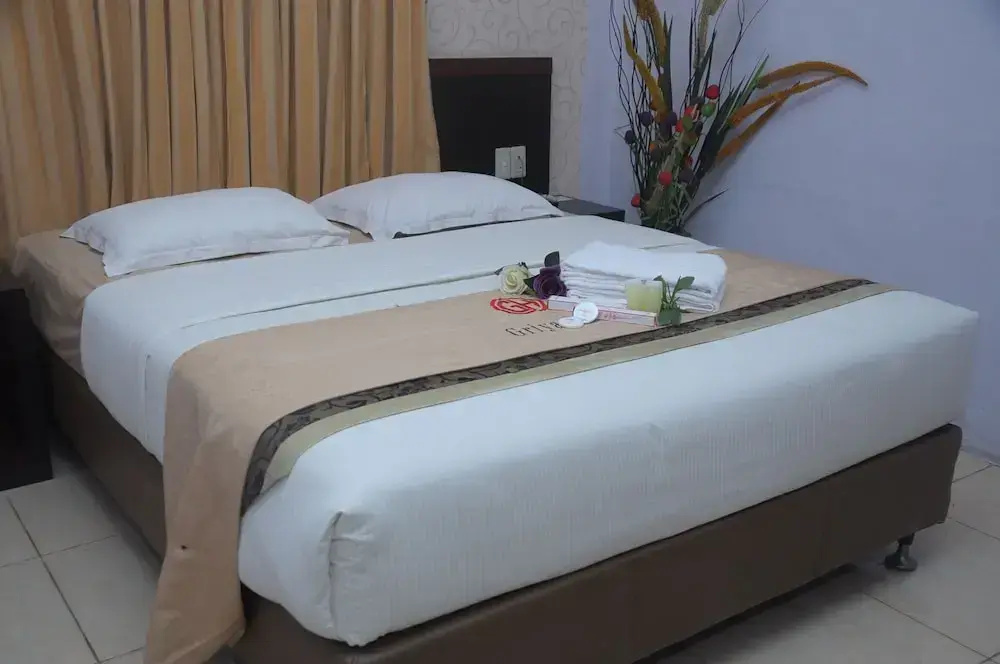 Griya Hotel - Chambres