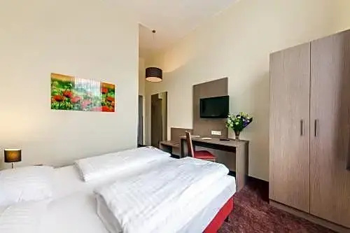 Hotel Maxim Dusseldorf City - Chambres