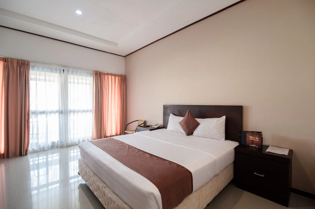 Surya Kencana Seaside Hotel - Chambres