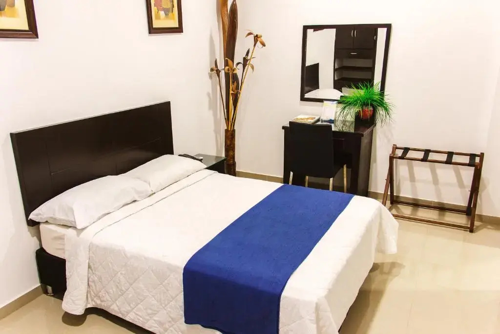Hotel la Ciudad - Chambres