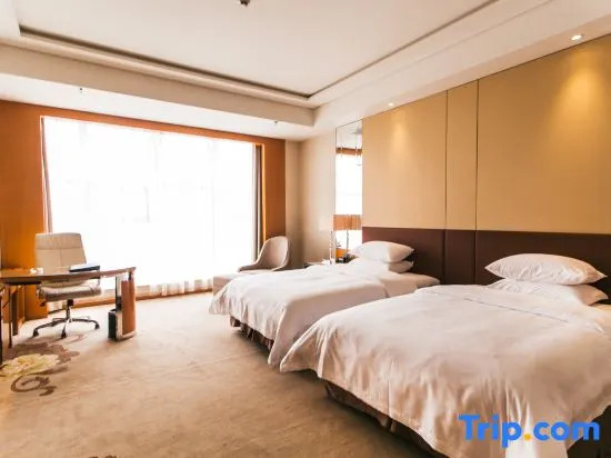 Двухместный номер Deluxe 2 отдельные кровати в Zhenhua Xinyue International Hotel