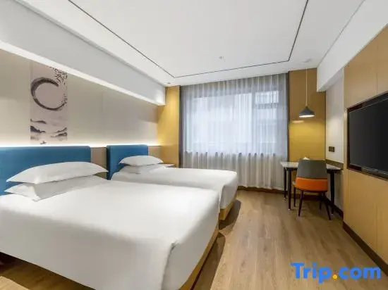 Xinyue Hotel - Chambres