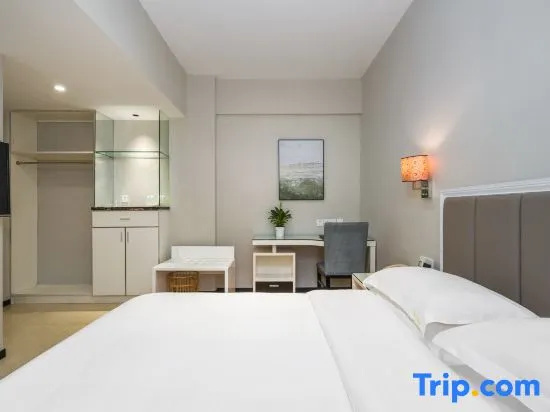 Jinyi Hotel - Chambres