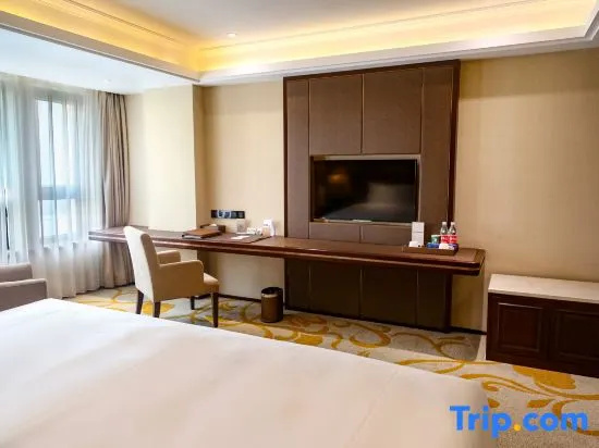 Sky World Hotel Qingdao - Chambres