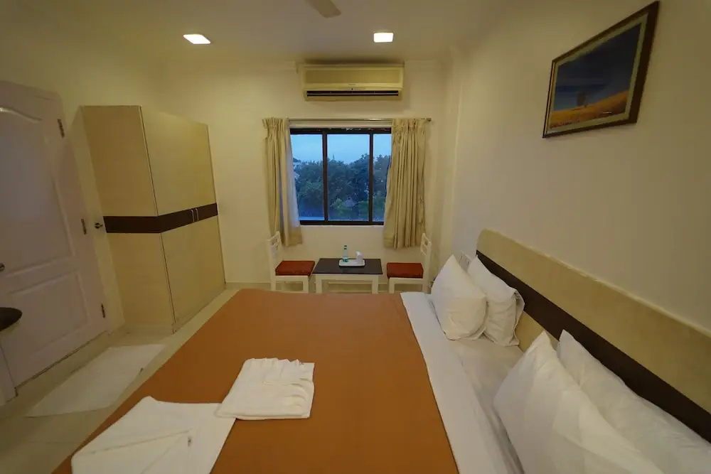 Hotel Palmyra Grand Inn - Chambres