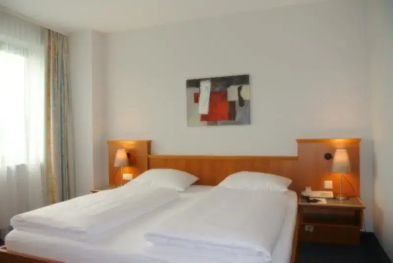 City Hotel am CCS - Chambres