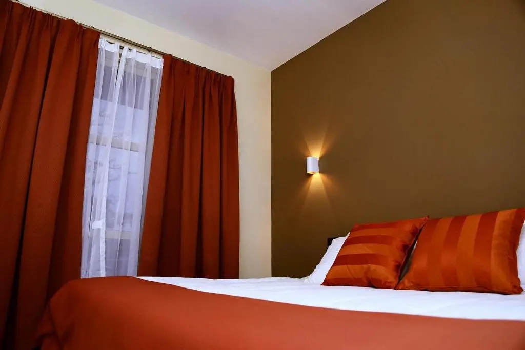 Qaribu Inn - Chambres