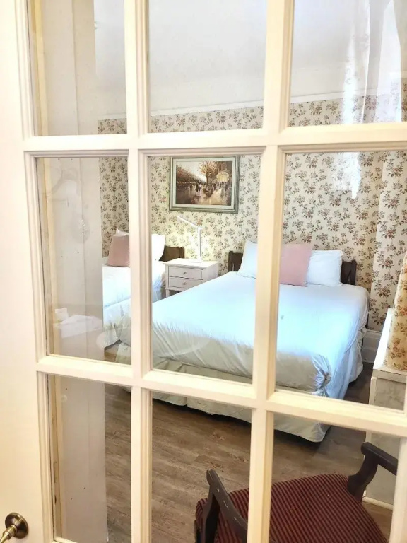 Standard Triple room with garden view